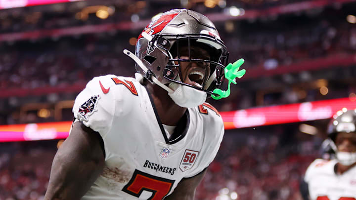 Sep 7, 2025; Atlanta, Georgia, USA; Tampa Bay Buccaneers running back Bucky Irving (7) celebrates after scoring a touchdown against the Atlanta Falcons during the third quarter at Mercedes-Benz Stadium. Mandatory Credit: Brett Davis-Imagn Images