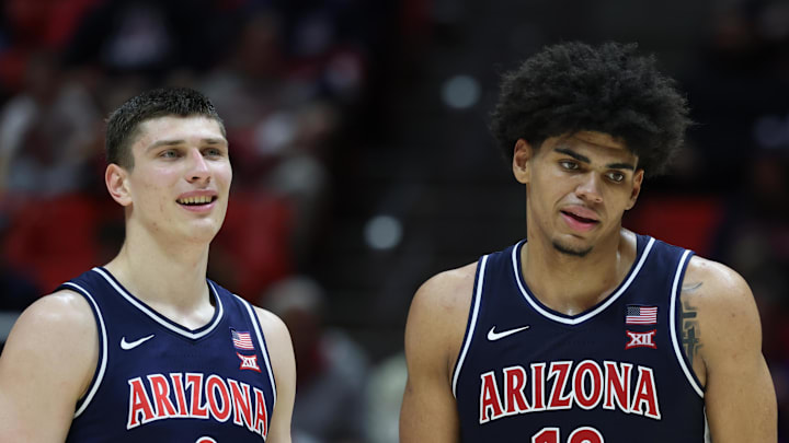Jan 3, 2026; Salt Lake City, Utah, USA; Arizona Wildcats forward Ivan Kharchenkov (8) and forward Koa Peat (10) wait for play to resume after a time in the the second half of the game against the Utah Utes at Jon M. Huntsman Center. Mandatory Credit: Rob Gray-Imagn Images Jan 3, 2026; Salt Lake City, Utah, USA; Arizona Wildcats forward Ivan Kharchenkov (8) and forward Koa Peat (10) wait for play to resume after a time in the the second half of the game against the Utah Utes at Jon M. Huntsman Center. Mandatory Credit: Rob Gray-Imagn Images