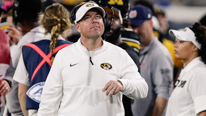 Dec 27, 2025; Jacksonville, FL, USA; Missouri Tigers head coach Eli Drinkwitz looks up at the scoreboard against the Virginia Cavaliers during the fourth quarter at EverBank Stadium. Mandatory Credit: Travis Register-Imagn Images