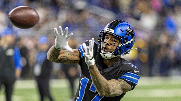 Jan 5, 2025; Detroit, Michigan, USA; Detroit Lions wide receiver Tim Patrick (17) catches the ball in warm ups before the game against the Minnesota Vikings at Ford Field. Mandatory Credit: David Reginek-Imagn Images