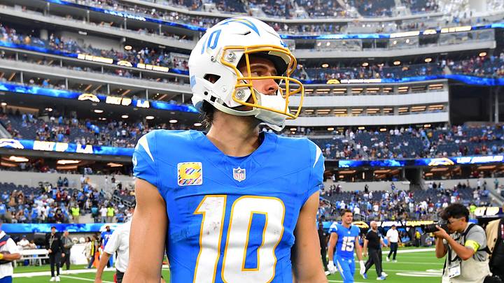 Oct 5, 2025; Inglewood, California, USA; Los Angeles Chargers quarterback Justin Herbert (10) reacts after the game against the Washington Commanders at SoFi Stadium. Mandatory Credit: Gary A. Vasquez-Imagn Images
