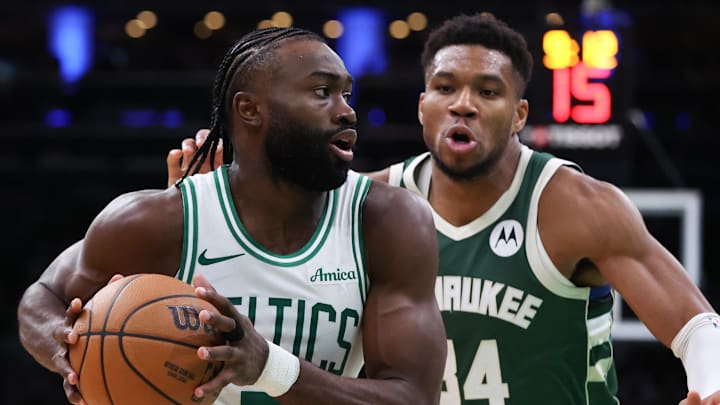 Oct 28, 2024; Boston, Massachusetts, USA; Boston Celtics forward Jaylen Brown (7) drives to the basket defended by Milwaukee Bucks forward Giannis Antetokounmpo (34) during the second half at TD Garden. Mandatory Credit: Paul Rutherford-Imagn Images