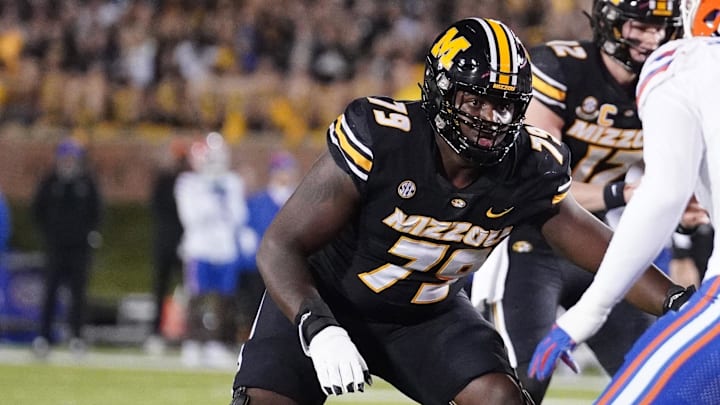 Nov 18, 2023; Columbia, Missouri, USA; Missouri Tigers offensive lineman Armand Membou (79) at the line of scrimmage against the Florida Gators during the game at Faurot Field at Memorial Stadium. Mandatory Credit: Denny Medley-Imagn Images