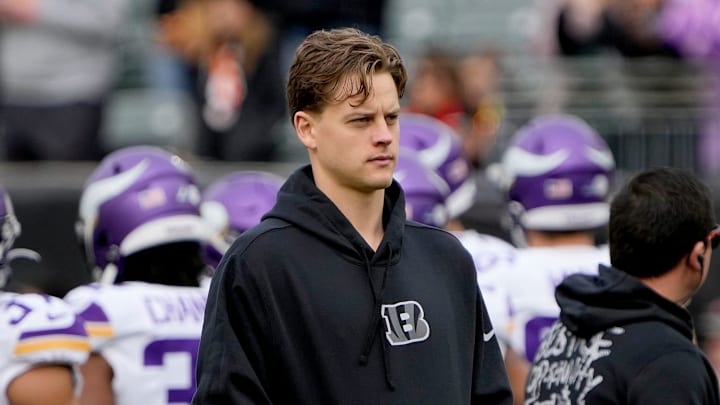 Cincinnati Bengals quarterback Joe Burrow (9) watches his teammates warm up at Paycor Stadium