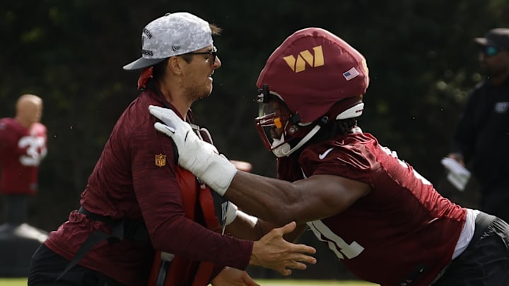 Washington Commanders defensive tackle Deatrich Wise Jr. (91) participates in a drill.