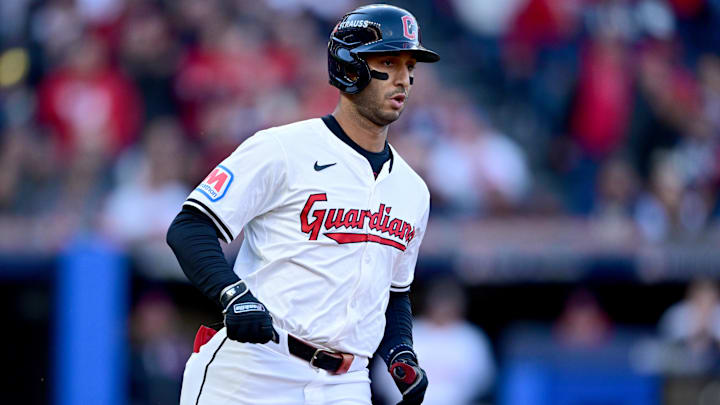 Oct 17, 2024; Cleveland, Ohio, USA; Cleveland Guardians shortstop Brayan Rocchio (4) singles during the third inning against the New York Yankees in game 3 of the American League Championship Series at Progressive Field. Mandatory Credit: David Dermer-Imagn Images Oct 17, 2024; Cleveland, Ohio, USA; Cleveland Guardians shortstop Brayan Rocchio (4) singles during the third inning against the New York Yankees in game 3 of the American League Championship Series at Progressive Field. Mandatory Credit: David Dermer-Imagn Images