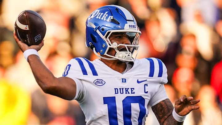 Nov 8, 2025; East Hartford, Connecticut, USA; Duke Blue Devils quarterback Darian Mensah (10) throws a pass against the UConn Huskies in the first quarter at Pratt & Whitney Stadium at Rentschler Field. Mandatory Credit: David Butler II-Imagn Images