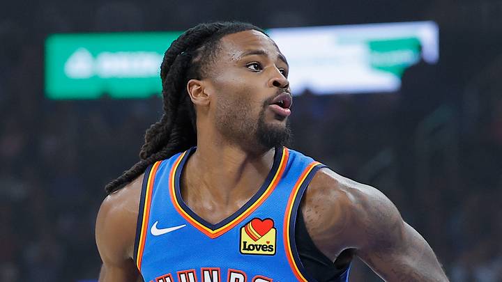 Oct 22, 2026; Oklahoma City, Oklahoma, USA; Oklahoma City Thunder guard Cason Wallace (22) drives to the basket as Denver Nuggets guard Jamal Murray (27) defends during the first quarter at Paycom Center. Mandatory Credit: Alonzo Adams-Imagn Images