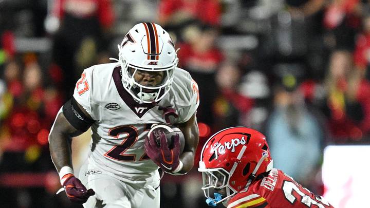 Sep 19, 2026; College Park, Md.; Virginia Tech running back Marcellous Hawkins, Jr. (27) breaks the tackle attempt from Maryland defensive back Messiah Delhomme (33). Sep 19, 2026; College Park, Md.; Virginia Tech running back Marcellous Hawkins, Jr. (27) breaks the tackle attempt from Maryland defensive back Messiah Delhomme (33).