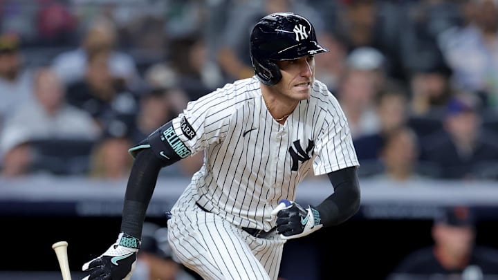 Sep 11, 2025; Bronx, New York, USA; New York Yankees center fielder Cody Bellinger (35) follows through on an RBI single against the Detroit Tigers during the fourth inning at Yankee Stadium. Mandatory Credit: Brad Penner-Imagn Images