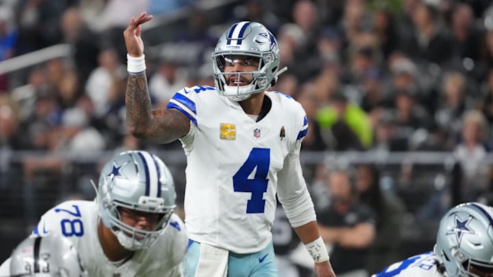 Dallas Cowboys quarterback Dak Prescott gestures at the line of scrimmage against the Las Vegas Raiders at Allegiant Stadium. 