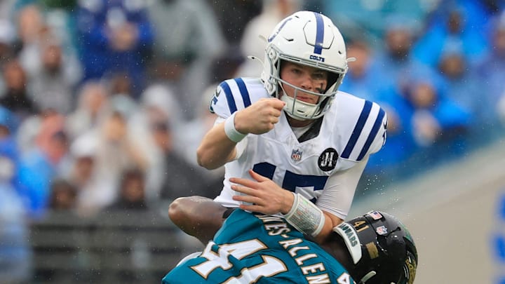 Jacksonville Jaguars defensive end Josh Hines-Allen (41) hurries Indianapolis Colts quarterback Riley Leonard (15) during the second quarter of an NFL football game at EverBank Stadium, Sunday, Dec. 7, 2025, in Jacksonville, Fla. [Corey Perrine/Florida Times-Union]