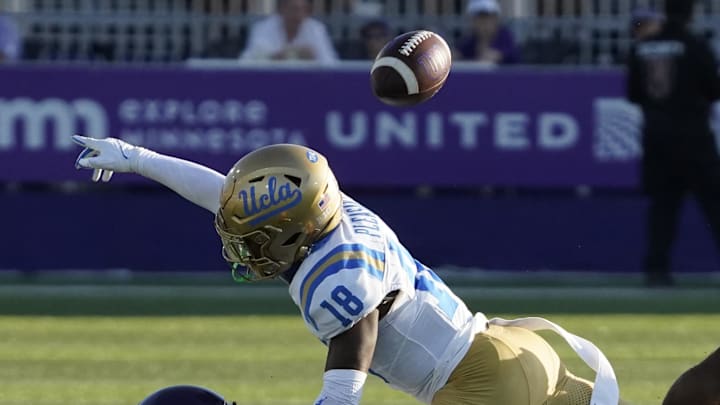 Sep 27, 2025; Evanston, Illinois, USA; UCLA Bruins defensive back Rodrick Pleasant (18) defends Northwestern Wildcats wide receiver Hayden Eligon II (80) during the second half at Northwestern Medicine Field at Martin Stadium. Mandatory Credit: David Banks-Imagn Images Sep 27, 2025; Evanston, Illinois, USA; UCLA Bruins defensive back Rodrick Pleasant (18) defends Northwestern Wildcats wide receiver Hayden Eligon II (80) during the second half at Northwestern Medicine Field at Martin Stadium. Mandatory Credit: David Banks-Imagn Images