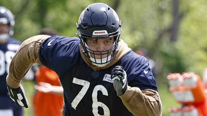 May 31, 2024; Lake Forest, IL, USA; Chicago Bears offensive tackle Teven Jenkins (76) runs during organized team activities at Halas Hall. Mandatory Credit: Kamil Krzaczynski-Imagn Images