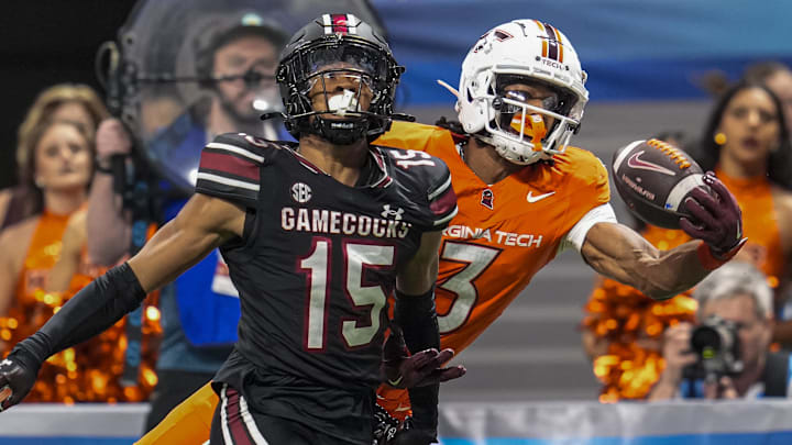 Virginia Tech Hokies WR Donavon Greene (3) tries secure catch behind South Carolina Gamecocks DB Brandon Cisse (15) Virginia Tech Hokies WR Donavon Greene (3) tries secure catch behind South Carolina Gamecocks DB Brandon Cisse (15)