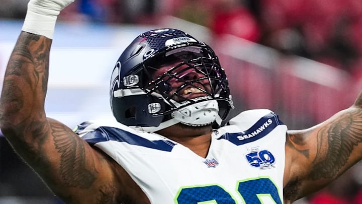 Leonard Williams of the Seattle Seahawks throws his hands