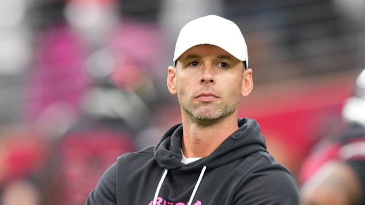 Oct 5, 2025; Glendale, Arizona, USA; Arizona Cardinals head coach Jonathan Gannon stands on the field before their game against the Tennessee Titans at State Farm Stadium. Mandatory Credit: Joe Camporeale-Imagn Images