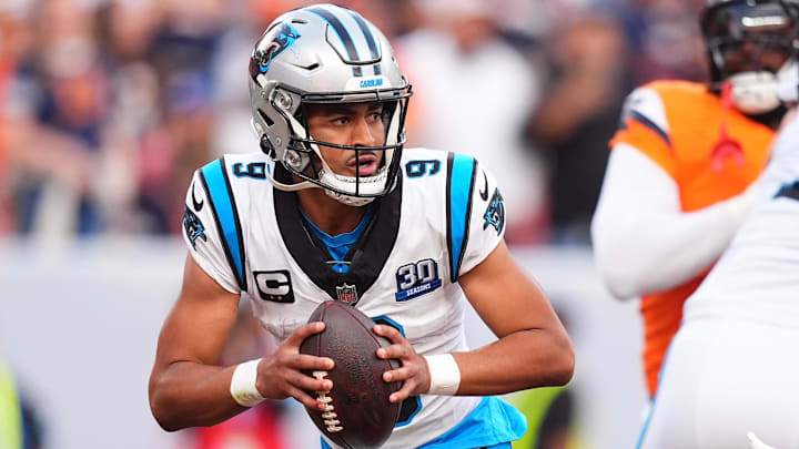 Oct 27, 2024; Denver, Colorado, USA; Carolina Panthers quarterback Bryce Young (9) prepares to pass the ball in the fourth quarter against the Denver Broncos at Empower Field at Mile High. Mandatory Credit: Ron Chenoy-Imagn Images