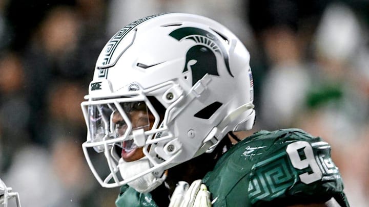Michigan State's Jalen Thompson, right, celebrates his tackle for a safety against Western Michigan during the third quarter on Friday, Aug. 29, 2025, in East Lansing.