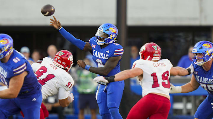 Aug 23, 2025; Lawrence, Kansas, USA; Kansas Jayhawks quarterback Jalon Daniels (6) throws a pass during the first half against the Fresno State Bulldogs at David Booth Kansas Memorial Stadium.