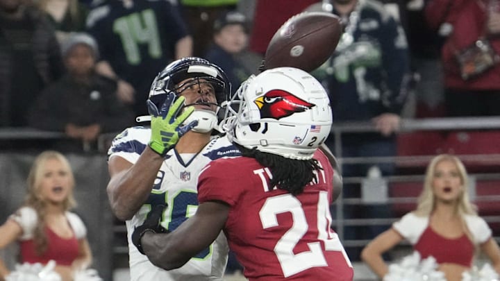 Seattle Seahawks wide receiver Tyler Lockett (16) catches a touchdown catch against Arizona Cardinals cornerback Starling Thomas V (24) during the fourth quarter at State Farm Stadium in Glendale on Jan. 7, 2024. Seattle Seahawks wide receiver Tyler Lockett (16) catches a touchdown catch against Arizona Cardinals cornerback Starling Thomas V (24) during the fourth quarter at State Farm Stadium in Glendale on Jan. 7, 2024.