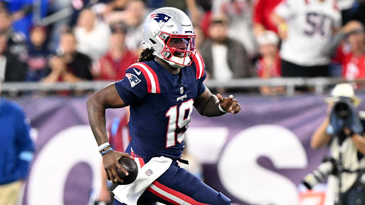 Aug 8, 2024; Foxborough, Massachusetts, USA; New England Patriots quarterback Joe Milton III (19) runs against against the Carolina Panthers  during the second half at Gillette Stadium. Mandatory Credit: Brian Fluharty-USA TODAY Sports