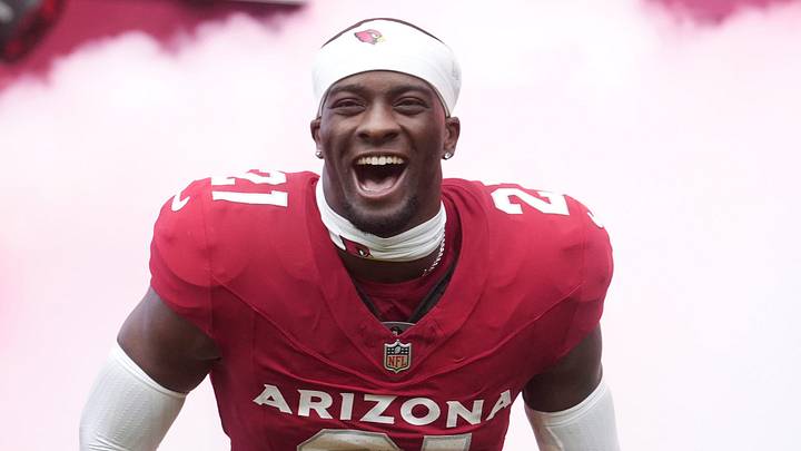 Arizona Cardinals cornerback Garrett Williams (21) is introduced before their game against the Carolina Panthers at State Farm Stadium on Sept 14, 2025. Arizona Cardinals cornerback Garrett Williams (21) is introduced before their game against the Carolina Panthers at State Farm Stadium on Sept 14, 2025.