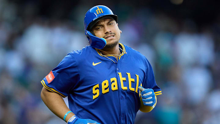 Aug 1, 2025; Seattle, Washington, USA; Seattle Mariners first baseman Josh Naylor (12) reacts after his fly ball is caught against the Texas Rangers during the third inning at T-Mobile Park. Mandatory Credit: John Froschauer-Imagn Images