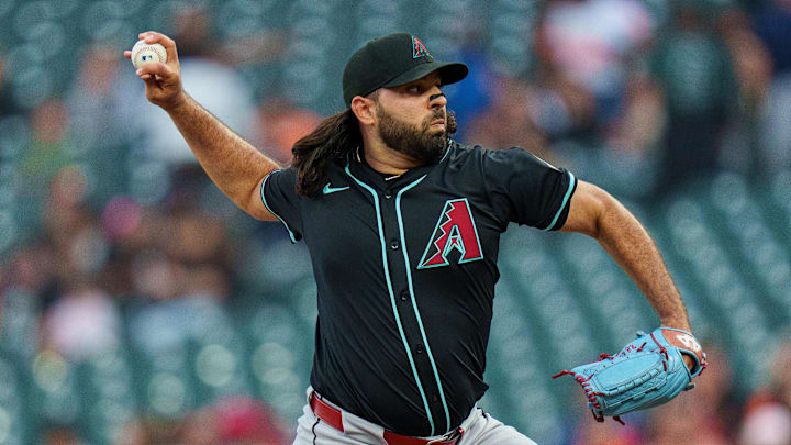 Arizona Diamondbacks starting pitcher Nabil Crismatt (61) delivers a pitch against the San Francisco Giants during the first inning at Oracle Park.