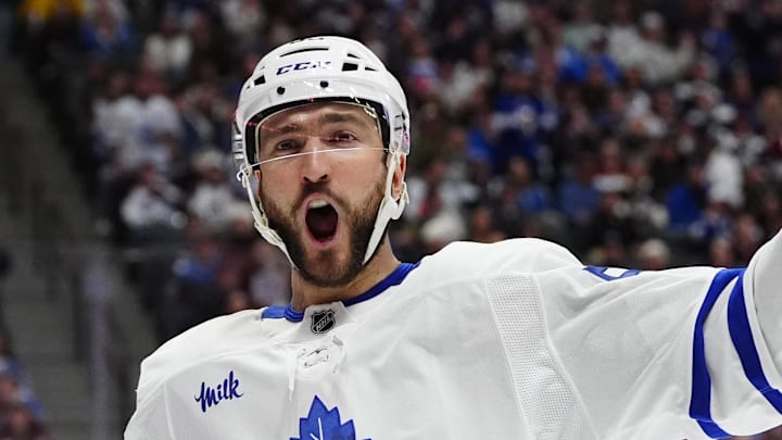 Jan 12, 2026; Denver, Colorado, USA; Toronto Maple Leafs center Nicolas Roy (55) celebrates a goal scored in the first period against the Colorado Avalanche at Ball Arena. Mandatory Credit: Ron Chenoy-Imagn Images