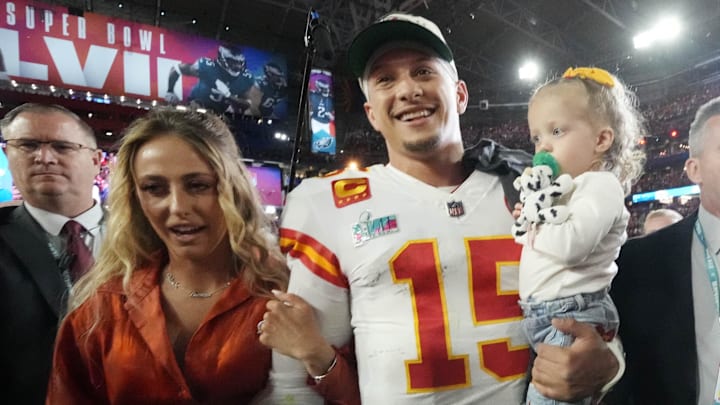 Feb 12, 2023; Glendale, AZ, USA; Kansas City Chiefs quarterback Patrick Mahomes (15) walks off the field with his wife Brittany and daughter Sterling after defeating the Philadelphia Eagles in Super Bowl LVII at State Farm Stadium. Mandatory Credit: Michael Chow/The Republic via Imagn Images Feb 12, 2023; Glendale, AZ, USA; Kansas City Chiefs quarterback Patrick Mahomes (15) walks off the field with his wife Brittany and daughter Sterling after defeating the Philadelphia Eagles in Super Bowl LVII at State Farm Stadium. Mandatory Credit: Michael Chow/The Republic via Imagn Images