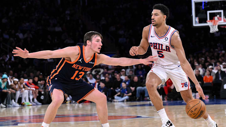 Philadelphia 76ers guard Quentin Grimes dribbles the ball as New York Knicks guard Tyler Kolek defends. Mandatory Credit: John Jones-Imagn Images