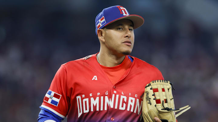 Mar 13, 2023; Miami, Florida, USA; Dominican Republic third baseman Manny Machado (13) runs to the dugout after the fifth inning against Nicaragua at LoanDepot Park. Mandatory Credit: Sam Navarro-Imagn Images