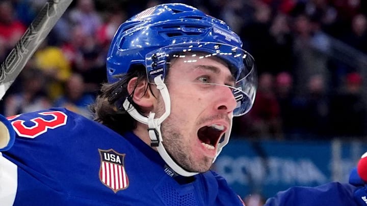 Quinn Hughes was a star at the Milan Olympics, but his most iconic moment came after the gold medal had already been won. (Mandatory Credit: Amber Searls-Imagn Images) Quinn Hughes was a star at the Milan Olympics, but his most iconic moment came after the gold medal had already been won. (Mandatory Credit: Amber Searls-Imagn Images)