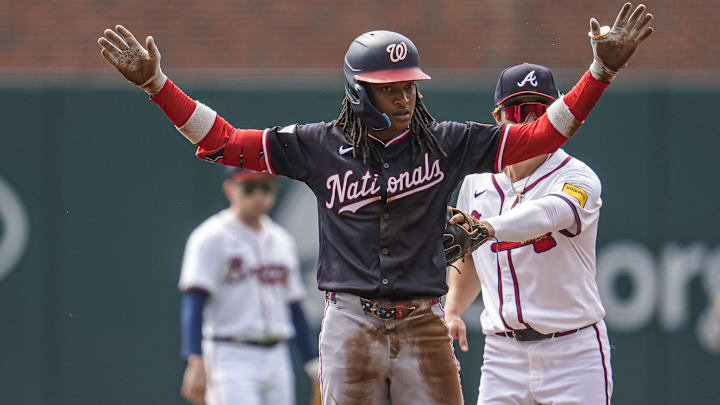 Sep 24, 2025; Cumberland, Georgia, USA; Washington Nationals shortstop CJ Abrams (5) reacts after hitting a double against the Atlanta Braves during the first inning at Truist Park. Mandatory Credit: Dale Zanine-Imagn Images