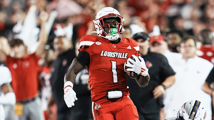 Louisville Cardinals running back Isaac Brown (1) scores a big fourth quarter touchdown against James Madison during the Cards' second college football game Friday September 5, 2025 at L&N Credit Union Stadium in Louisville, Kentucky. The Cards beat the Dukes 28-14. Louisville Cardinals running back Isaac Brown (1) scores a big fourth quarter touchdown against James Madison during the Cards' second college football game Friday September 5, 2025 at L&N Credit Union Stadium in Louisville, Kentucky. The Cards beat the Dukes 28-14.