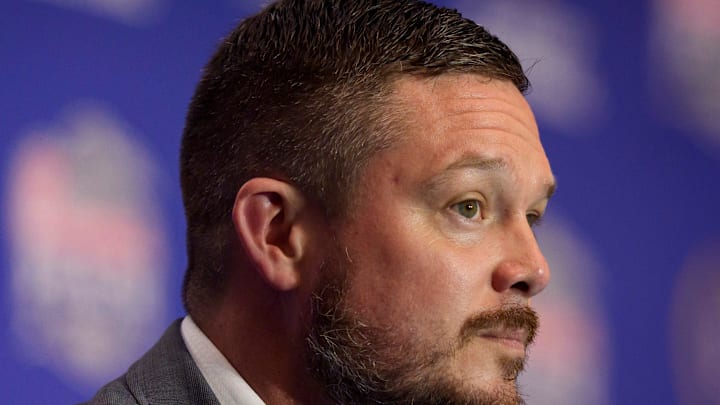 Oregon head coach Dan Lanning listens to a reporter’s question during the head coaches’ press conference ahead of the Peach Bowl at the College Football Hall of Fame in Atlanta, Georgia, on Jan. 8, 2026.