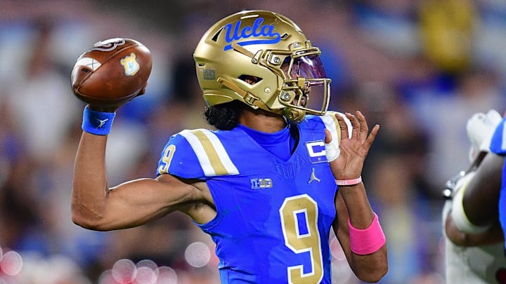 Aug 30, 2025; Pasadena, California, USA; UCLA Bruins quarterback Nico Iamaleava (9) throws against the Utah Utes during the second half at Rose Bowl. Mandatory Credit: Gary A. Vasquez-Imagn Images
