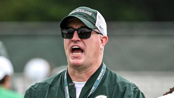 Michigan State’s head coach Pat Fitzgerald calls out to players during football practice on Thursday, Aug. 6, 2026, in East Lansing. Michigan State’s head coach Pat Fitzgerald calls out to players during football practice on Thursday, Aug. 6, 2026, in East Lansing.