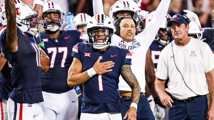 Sep 12, 2025; Tucson, Arizona, USA; Arizona Wildcats quarterback Noah Fifita (1) and teammates celebrate after the touchdown they made is confirmed by replay against the Kansas State Wildcats during the second quarter of the game at Arizona Stadium. Mandatory Credit: Aryanna Frank-Imagn Images