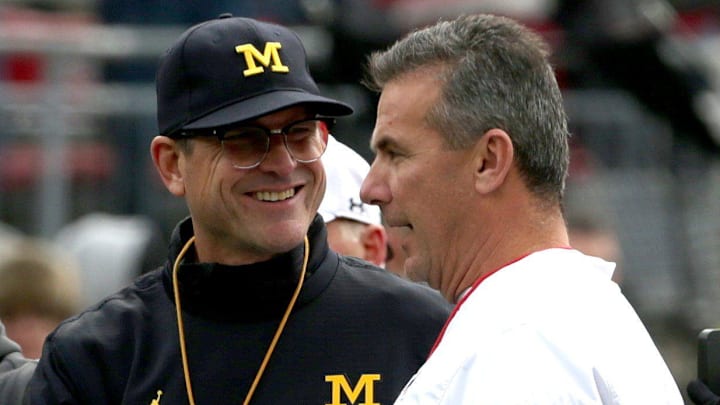 Michigan coach Jim Harbaugh and Ohio State coach Urban Meyer shake hands at midfield before the game at Ohio Stadium in Columbus, Ohio on Nov. 26, 2016.

Jim  Harbaugh, Urban Meyer