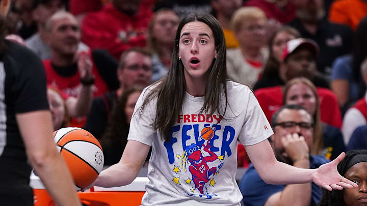 Indiana Fever guard Caitlin Clark (22) reacts to a call from the referee Tuesday, Aug. 12, 2025, during the game at Gainbridge Fieldhouse in Indianapolis. The Dallas Wings defeated the Indiana Fever, 81-80.