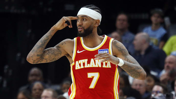 Atlanta Hawks guard Nickeil Alexander-Walker (7) reacts after a three-point basket during the fourth quarter against the Memphis Grizzlies at FedExForum on January 21, 2026.