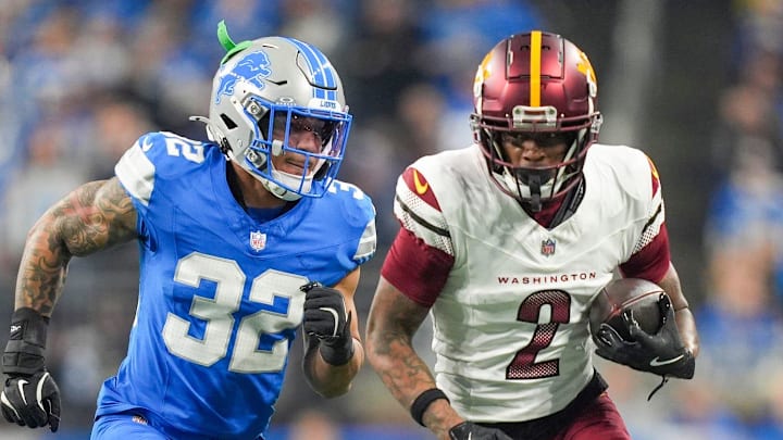 Detroit Lions safety Brian Branch (32) runs after Washington Commanders wide receiver Dyami Brown (2) 