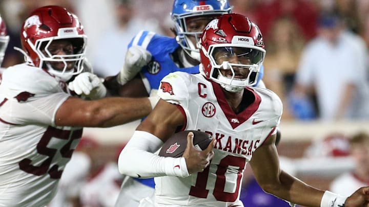 Arkansas Razorback quarterback Taylen Green (10) runs the ball during the fourth quarter against the Ole Miss Rebels at Vaught-Hemingway Stadium in Oxford, Miss. Arkansas Razorback quarterback Taylen Green (10) runs the ball during the fourth quarter against the Ole Miss Rebels at Vaught-Hemingway Stadium in Oxford, Miss.