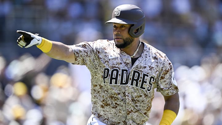 Aug 24, 2025; San Diego, California, USA; San Diego Padres catcher Elias Diaz (17) celebrates after hitting a two-run home run during the third inning against the Los Angeles Dodgers at Petco Park. Mandatory Credit: Denis Poroy-Imagn Images