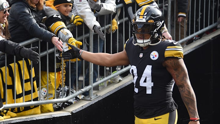 Jan 8, 2023; Pittsburgh, Pennsylvania, USA;  Pittsburgh Steelers running back Benny Snell Jr. greets fans as he makes his way to the field before playing the Cleveland Browns at Acrisure Stadium. Mandatory Credit: Philip G. Pavely-Imagn Images