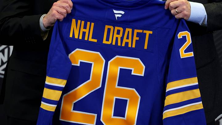 Jan 12, 2026; Buffalo, New York, USA;  NHL Commissioner Gary Bettman and Buffalo Sabres owner Terry Pegula pose for a photo during a press conference announcing the 2026 NHL Draft taking place in Buffalo at KeyBank Center. Mandatory Credit: Timothy T. Ludwig-Imagn Images
