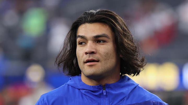 Los Angeles Rams wide receiver Puka Nacua (12) walks on the field.