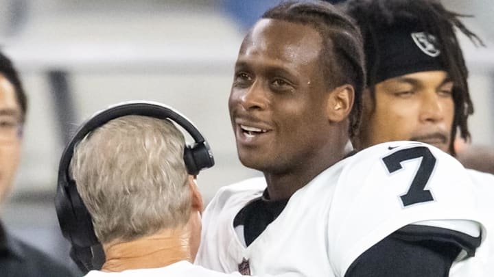 Aug 23, 2025; Glendale, Arizona, USA; Las Vegas Raiders quarterback Geno Smith (7) hugs head coach Pete Carroll against the Arizona Cardinals during a preseason NFL game at State Farm Stadium. Mandatory Credit: Mark J. Rebilas-Imagn Images